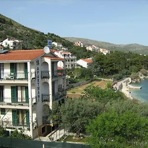 G Traù